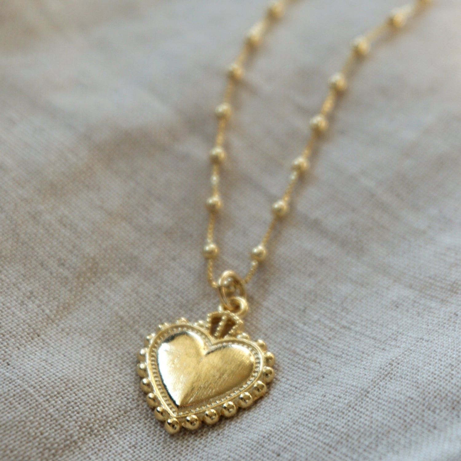 Cadena balines enchapado corazón detente